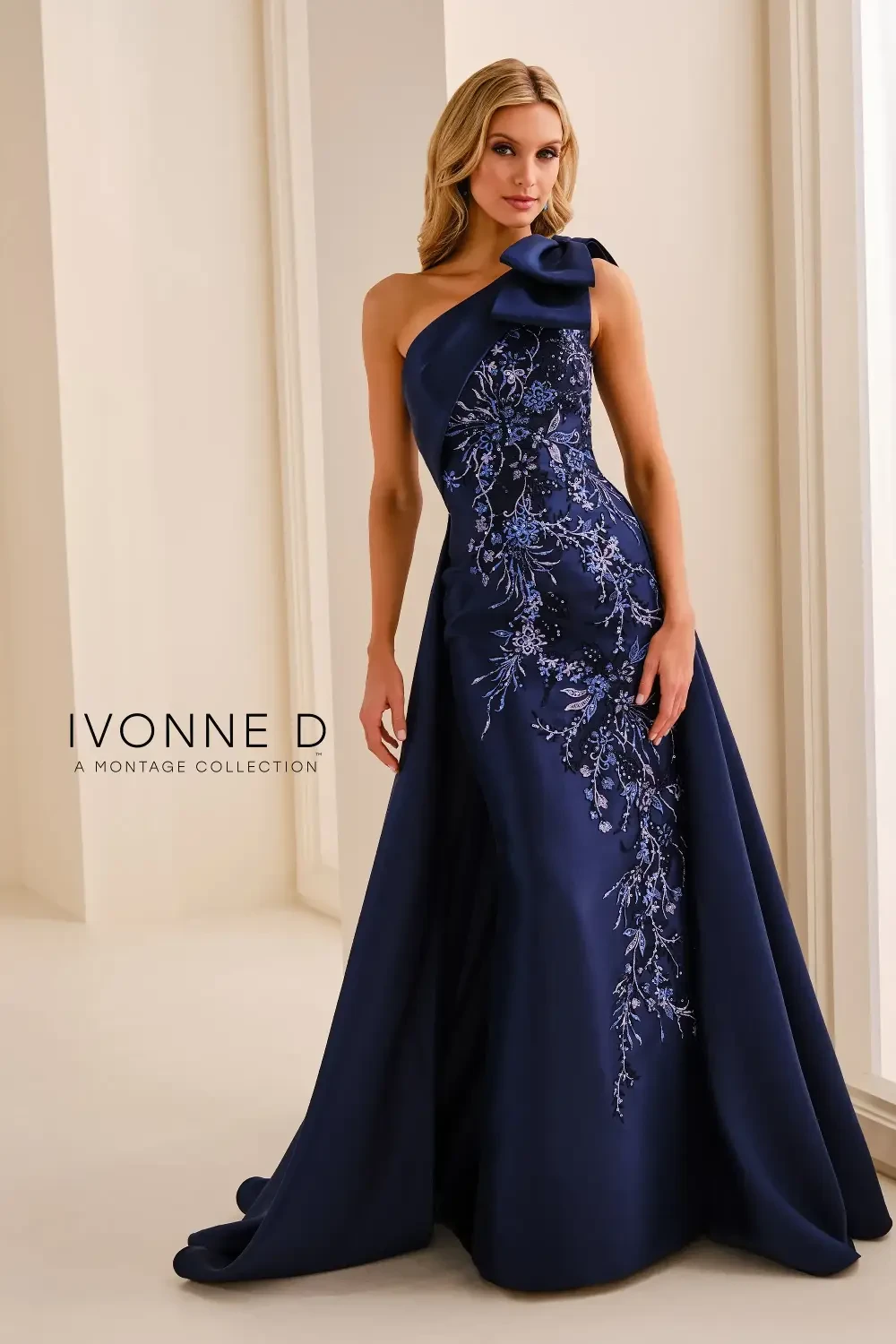 model is wearing a one shoulder blue mother of the bride gown